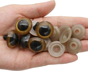 32 dílků, velikost 22 mm, 4 barvy (černá, hnědá, zlatá, průhledná), plastové bezpečnostní oči pro