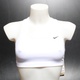 Sportovní podprsenka Nike BV3630 bílá vel. M