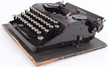 Kufříkový psací stroj Elektra