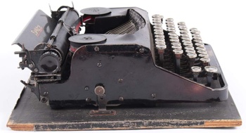 Kufříkový psací stroj Elektra