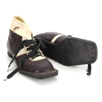 Staré kožené běžkařské boty černo bílé