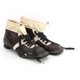 Staré kožené běžkařské boty černo bílé